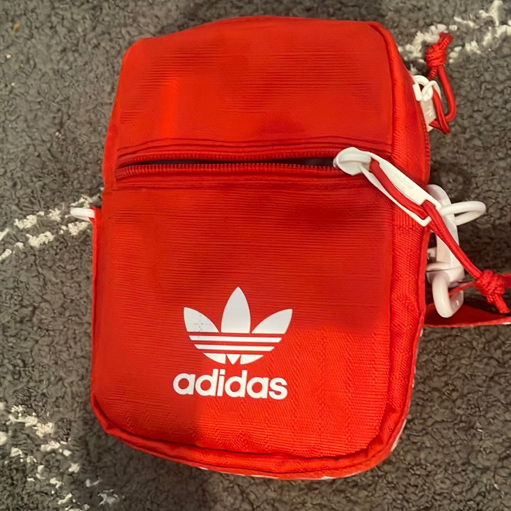 Never worn Addis’s purse